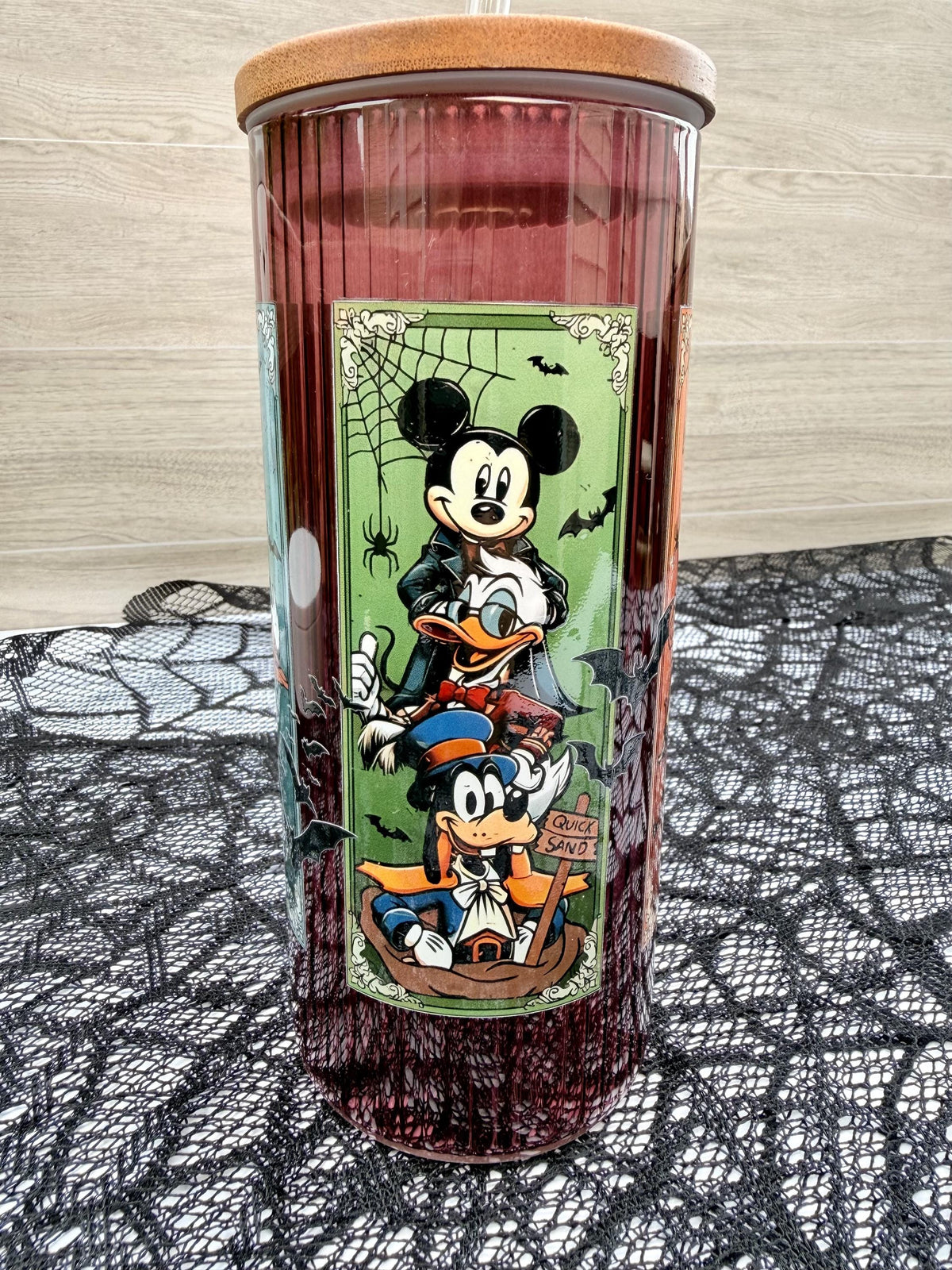 Haunted Mansion Stretching Portraits | 20 oz Burgundy Glass Cup with Bamboo Lid | Haunted Mansion Gift | Spooky Halloween Tumbler